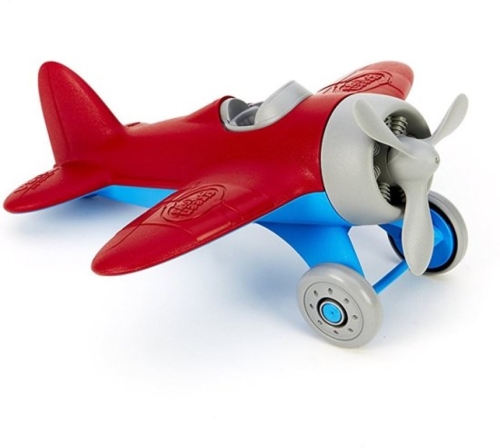 Grünes Spielzeug Flugzeug Rot